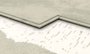 An illustration of our damping glue between två layers of floor boards.