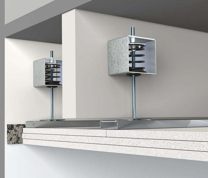 View of the components making up the Vibratec's ceiling system VT-MSH. The spring isolator has a natural frequency between 4-5 Hz which greatly reduces vibrations and unwanted noise. This example of a suspended ceiling has three layers of gypsum boards.